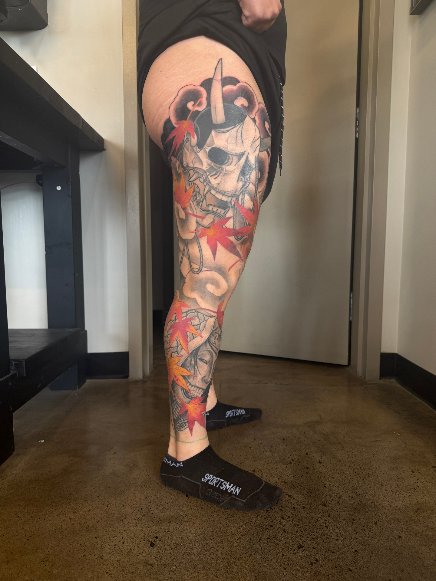 Japanese leg sleeve with skull, maple leaves, and clouds by Curt Travis